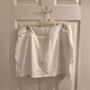 tangerine mini skort